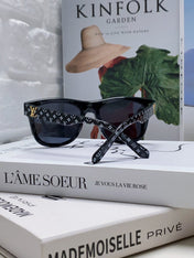MONOGRAM SUNGLASS 581386 IN BLACK ACETATE FRAME