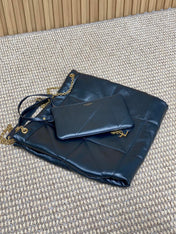 DRAWSTRING CHAIN STRAP SHOULDER BAG 39 IN BLACK QUILTED CALFSKIN
