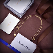 CD 26S CD LOGO BLACK BEAD DROP NECKLACE IN GOLD TONE METAL 631856