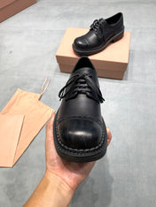 MIUMIU 26S LACE-UP LOAFERS IN BLACK GRAINED CALFSKIN