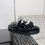 CHANEL 26S PLATFORM SLIDE SANDALS IN BLACK SHEARLING AND WHITE LOGO GG DALMATIAN PRINT