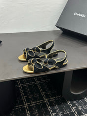 CHANEL 26S BOW SANDALS IN BLACK MIX GOLD SATIN