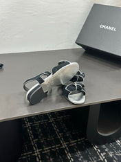 CHANEL 26S BOW SANDALS IN BLACK AND SILVER SUEDE