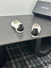 CHANEL 26S FLAT SHOES IN WHITE AND BLACK LAMBSKIN