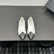 CHANEL 26S FLAT SHOES IN WHITE AND BLACK LAMBSKIN