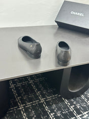 CHANEL 26S FLAT SHOES IN BLACK LAMBSKIN