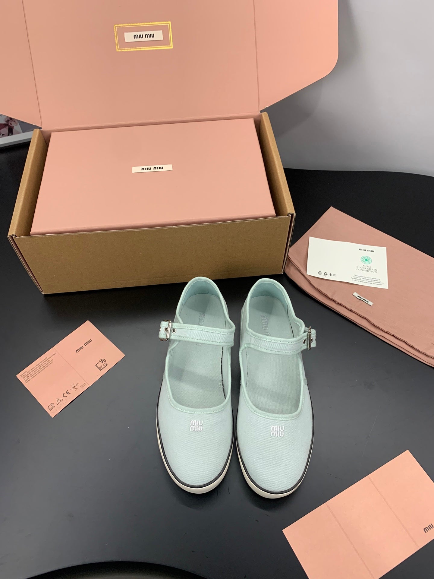 MIUMIU 26S MARY JANE FLATS IN PALE MINT CANVAS LOGO