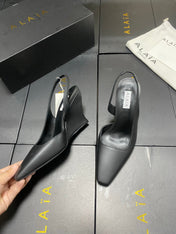 ALAIA 26S WEDGE SLINGBACKS 95 MM IN BLACK CALFSKIN