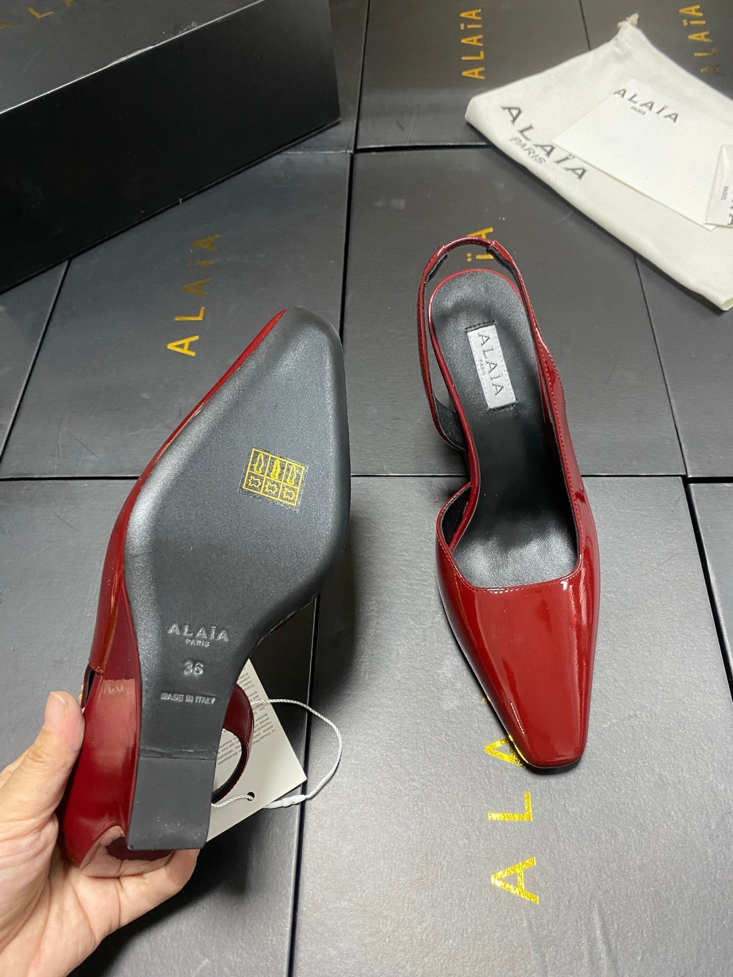 ALAIA 26S WEDGE SLINGBACKS 95 MM IN DARK RED PATENT CALFSKIN
