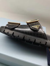 PRADA 26S STRAP SLIDES IN BLACK CROC EMBOSSED CALFSKIN GOLD HARDWARE