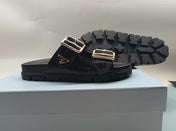 PRADA 26S STRAP SLIDES IN BLACK CROC EMBOSSED CALFSKIN GOLD HARDWARE