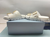 PRADA 26S STRAP SLIDES IN IVORY WHITE CROC EMBOSSED CALFSKIN GOLD HARDWARE