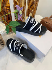 CHLOÉ WOODY WEDGE SANDALS IN BLACK MIX WHITE CANVAS WITH RUBBER SOLE