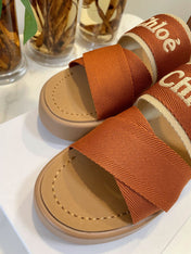 CHLOÉ WOODY WEDGE SANDALS IN BRONZE BROWN CANVAS WITH CIDER BROWN RUBBER SOLE