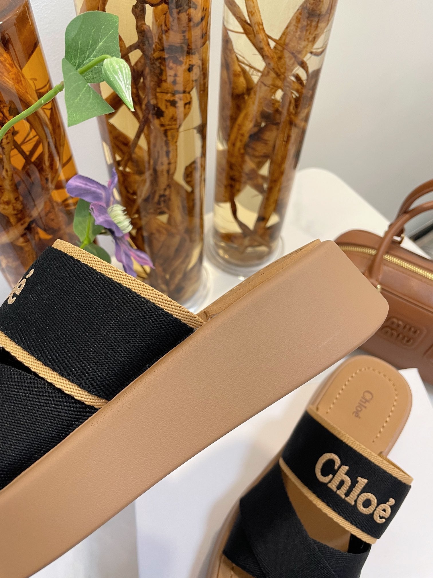 CHLOÉ WOODY WEDGE SANDALS IN BLACK CANVAS WITH CIDER BROWN RUBBER SOLE