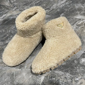 PRADA 26S ANKLE BOOTS IN BEIGE FUR