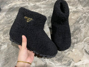 PRADA 26S ANKLE BOOTS IN BLACK FUR