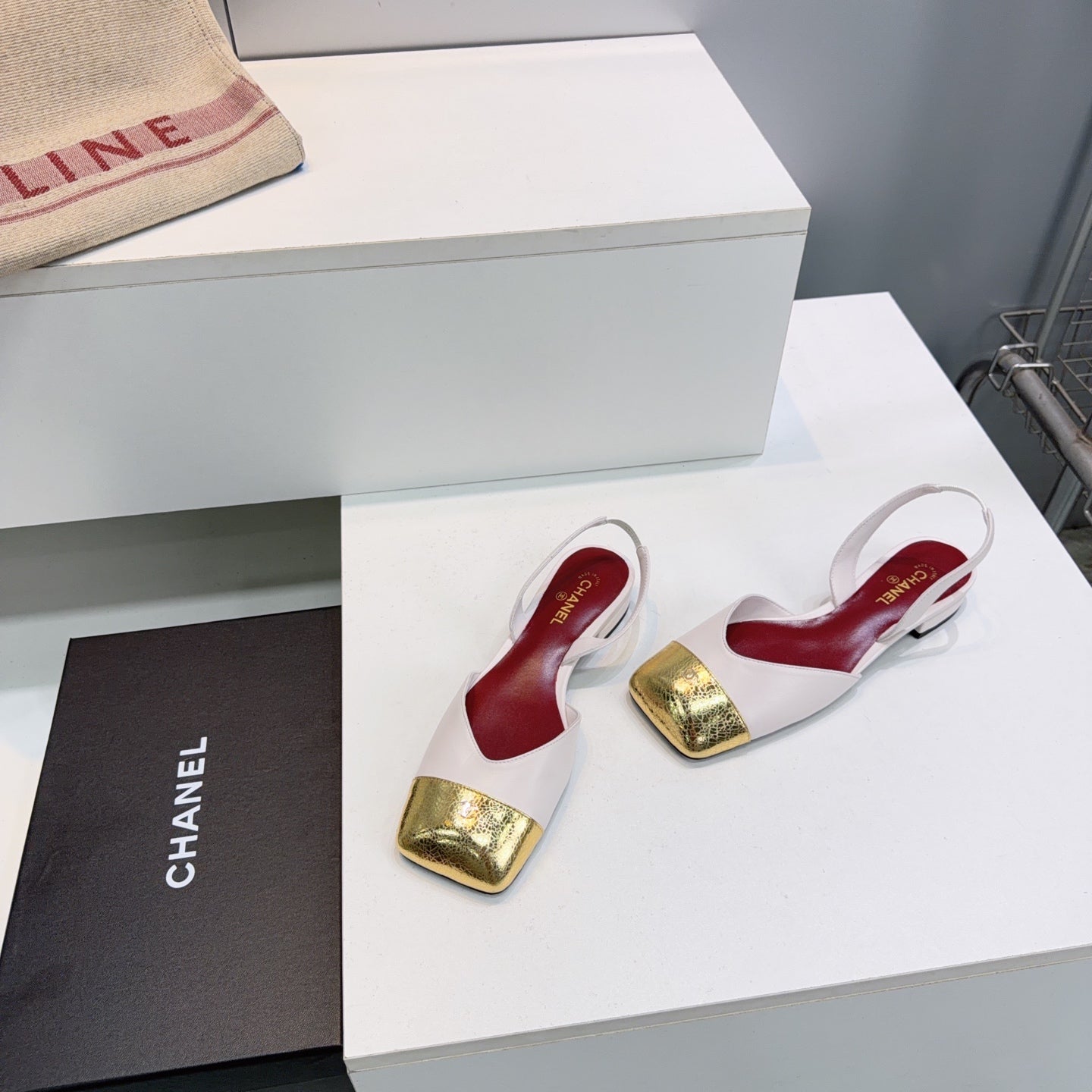 CHANEL 26S FLAT SLINGBACK IN WHITE LAMBSKIN WITH GOLD CAP TOE