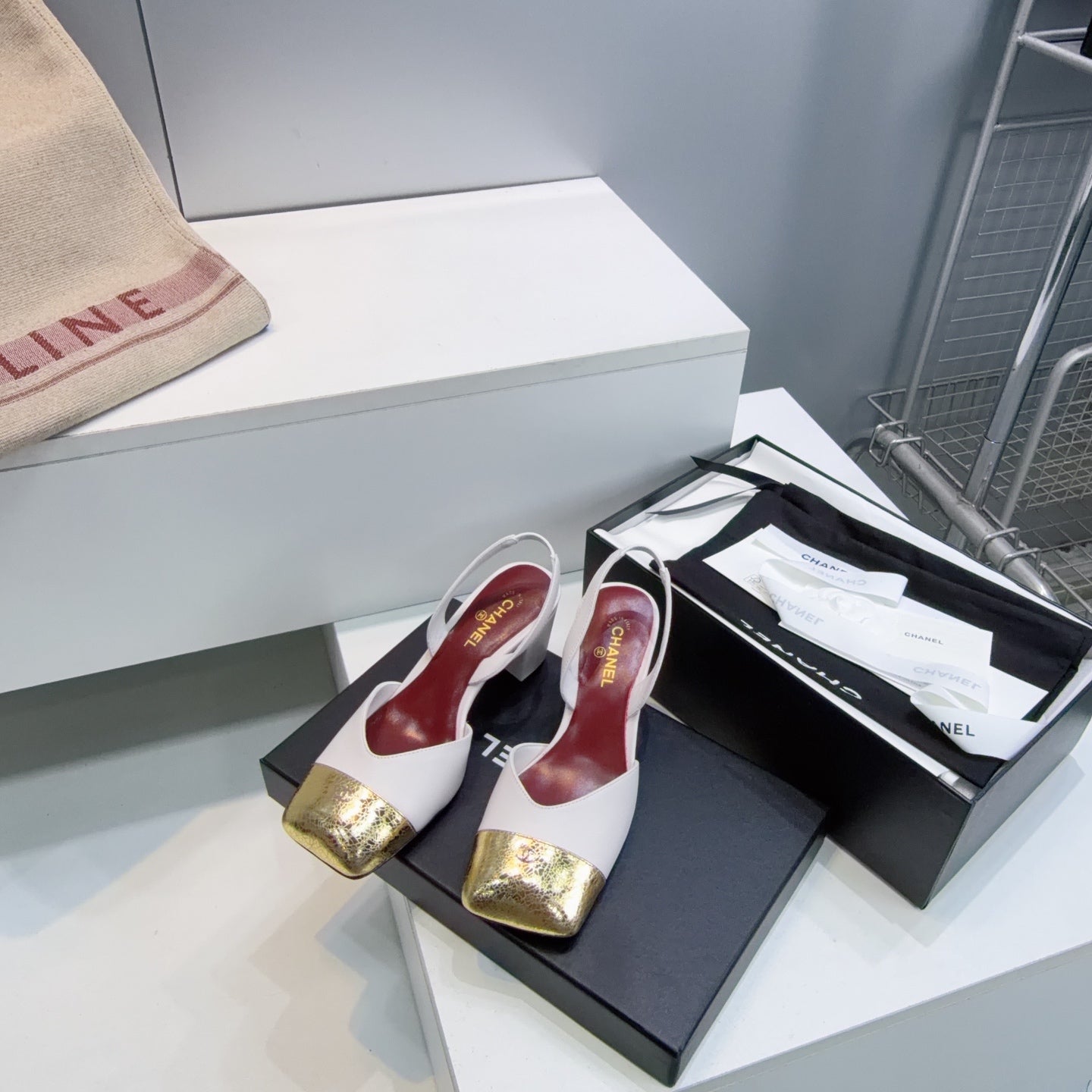 CHANEL 26S SLINGBACK 55 MM IN WHITE LAMBSKIN WITH GOLD CAP TOE