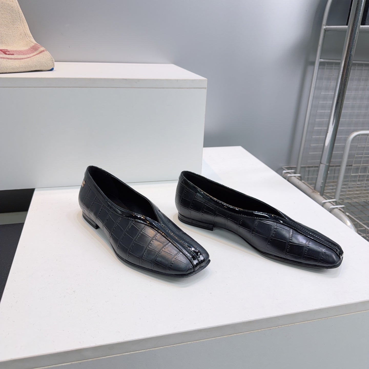 CHANEL 26S SQUARE-TOE FLATS IN BLACK CROCODILE-EMBOSSED LAMBSKIN