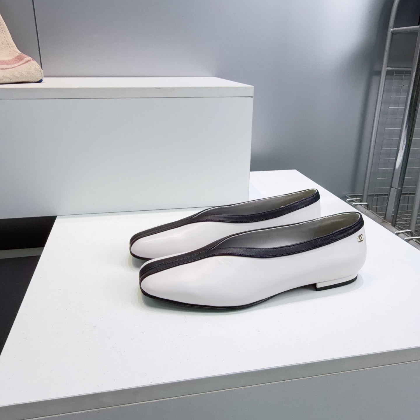 CHANEL 26S SQUARE-TOE FLATS IN WHITE LAMBSKIN WITH BLACK TRIM