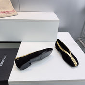 CHANEL 26S SQUARE-TOE FLATS IN BLACK SUEDE WITH GOLD PATENT TRIM