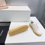 CHANEL 26S GUM SOLE SNEAKERS IN OFF-WHITE SUEDE