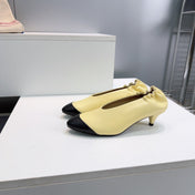 CHANEL 26S COLOR-BLOCK HIGH HEELS 45 MM IN YELLOW AND BLACK LAMBSKIN
