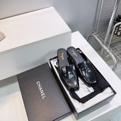 CHANEL 26S LOAFER MULES IN BLACK PATENT LAMBSKIN