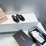 CHANEL 26S LOAFER MULES IN BLACK PATENT LAMBSKIN