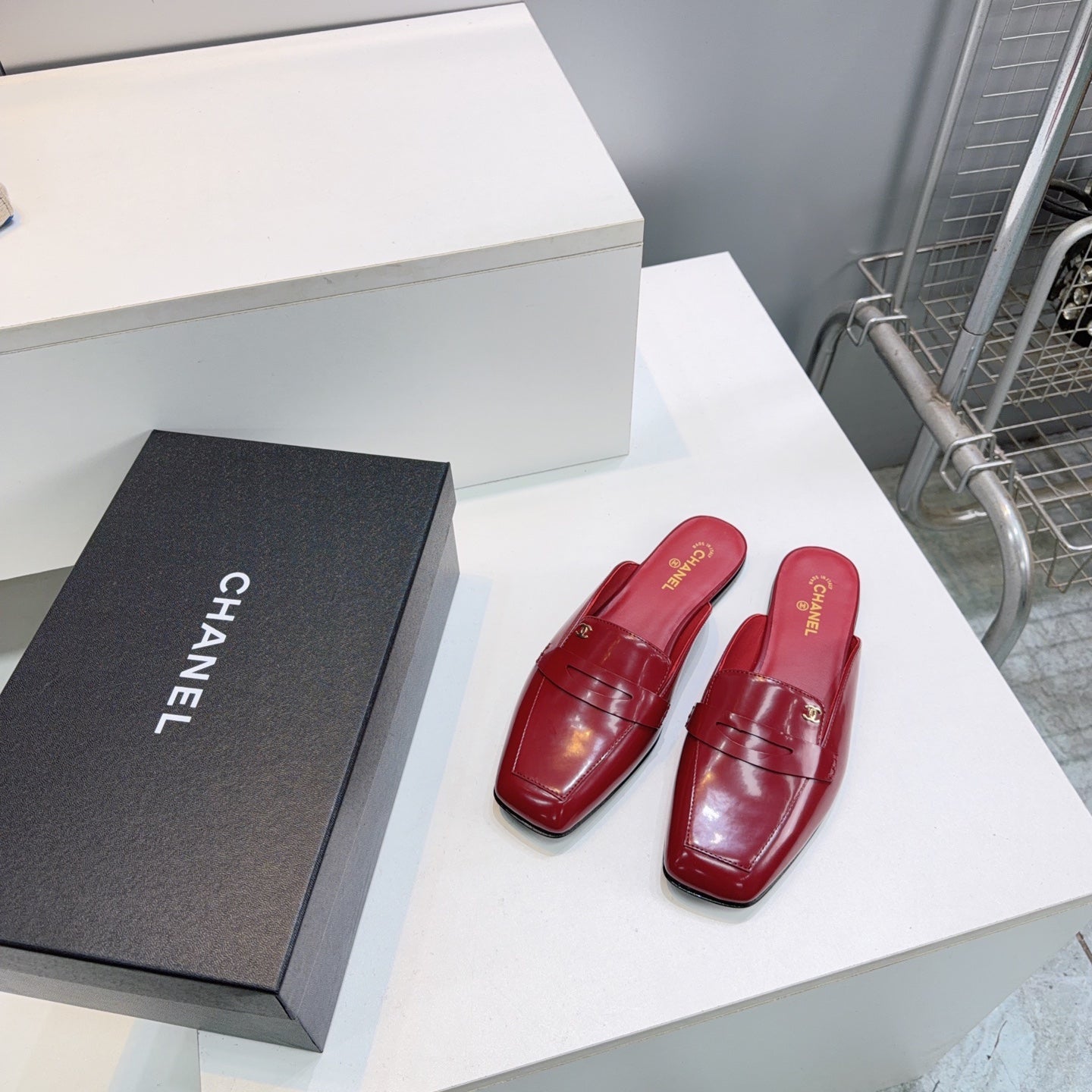 CHANEL 26S LOAFER MULES IN BURGUNDY PATENT LAMBSKIN