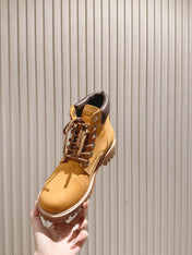 CELINE 25S MARTIN BOOTS IN MEDIUM ORANGE CALFSKIN