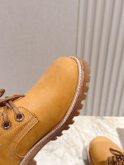 CELINE 25S MARTIN BOOTS IN MEDIUM ORANGE CALFSKIN