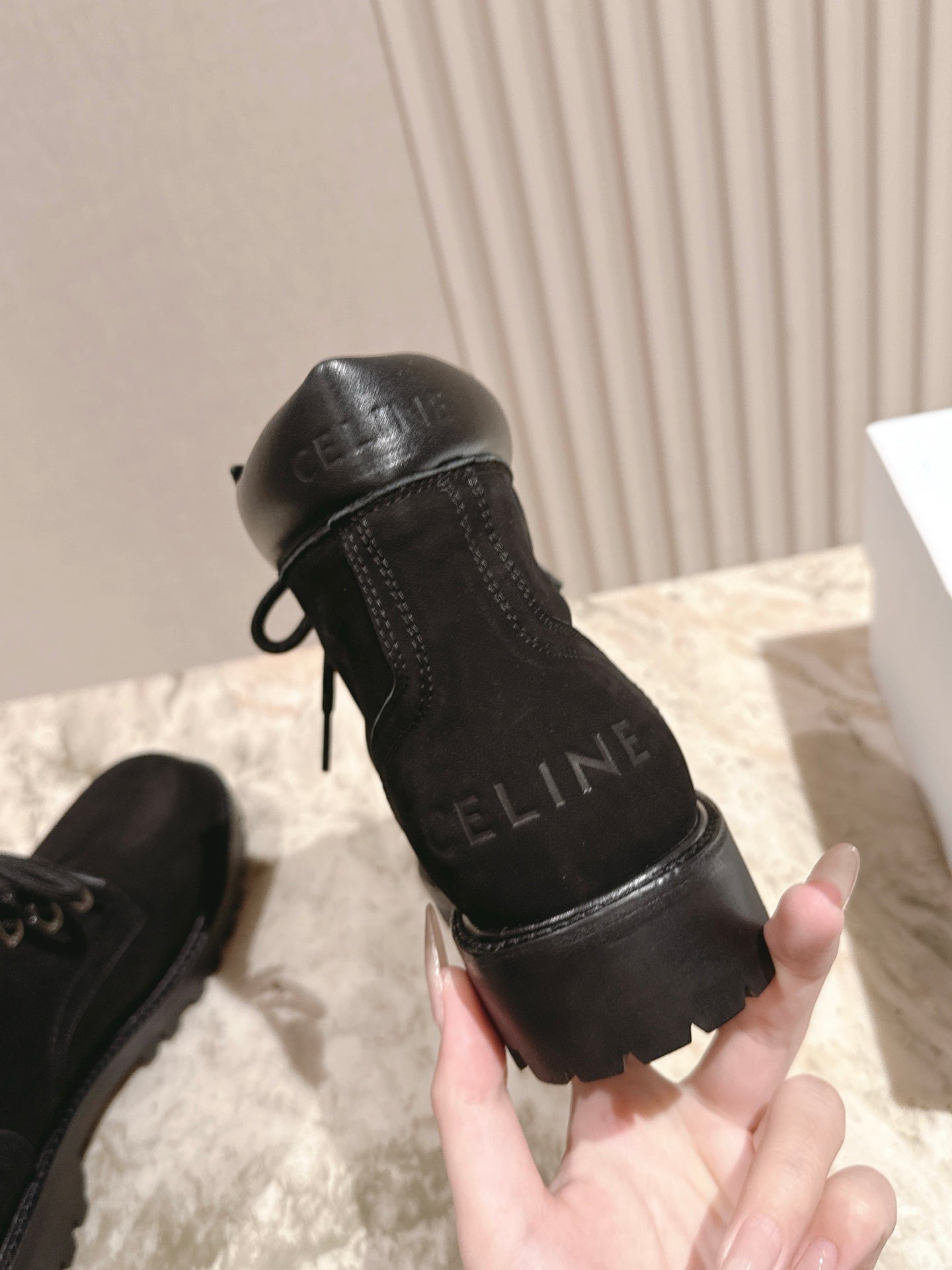 CELINE 25S MARTIN BOOTS IN BLACK CALFSKIN