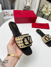Vlogo embellished leather-trimmed raffia slides black