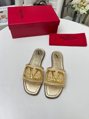 Vlogo embellished leather-trimmed raffia slides gold