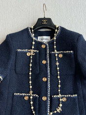CHANEL SHORT-SLEEVE WOOL JACKET STYLE 29