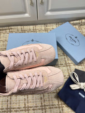 PRADA 26S LOW TOP SNEAKERS IN PINK NYLON AND SUEDE