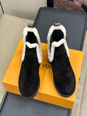 ASPEN CHELSEA ANKLE BOOTS IN BLACK MONOGRAM-DEBOSSED SUEDE