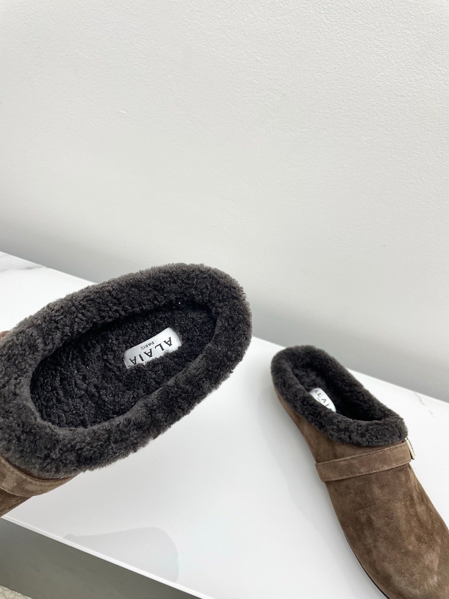 ALAIA 26S MULE IN DARK BROWN SUEDE AND WOOL