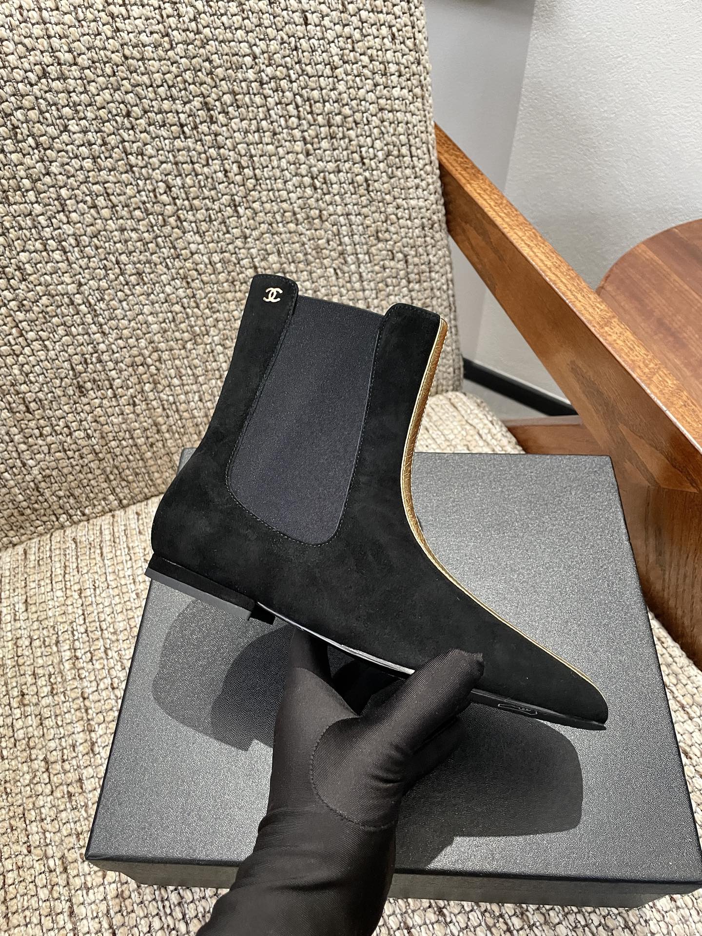 CHANEL 26S ANKLE BOOTS IN BLACK SUEDE WITH CONTRASTING GOLD TONE TRIM