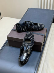 ALAIA 26S CROSS-STRAP FLATS IN BLACK SUEDE WITH SILVER HARDWARE
