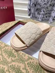 GG SLIDES IN NUDE BEIGE SUEDE WITH EMBOSSED LOGO STYLE 2