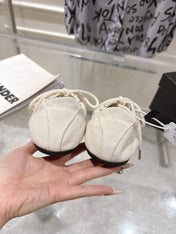 PRADA 26S COLLAPSE SNEAKERS IN WHITE CANVAS