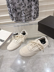 PRADA 26S COLLAPSE SNEAKERS IN WHITE CANVAS