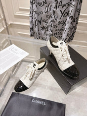 CHANEL 26S HIGH HEEL ANKLE BOOTS 70 MM IN WHITE LAMBSKIN AND BLACK PATENT CALFSKIN