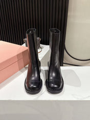 MIUMIU 26S PLATFORM HIGH-HEEL BOOTS 50MM IN BLACK GLOSSY CALFSKIN