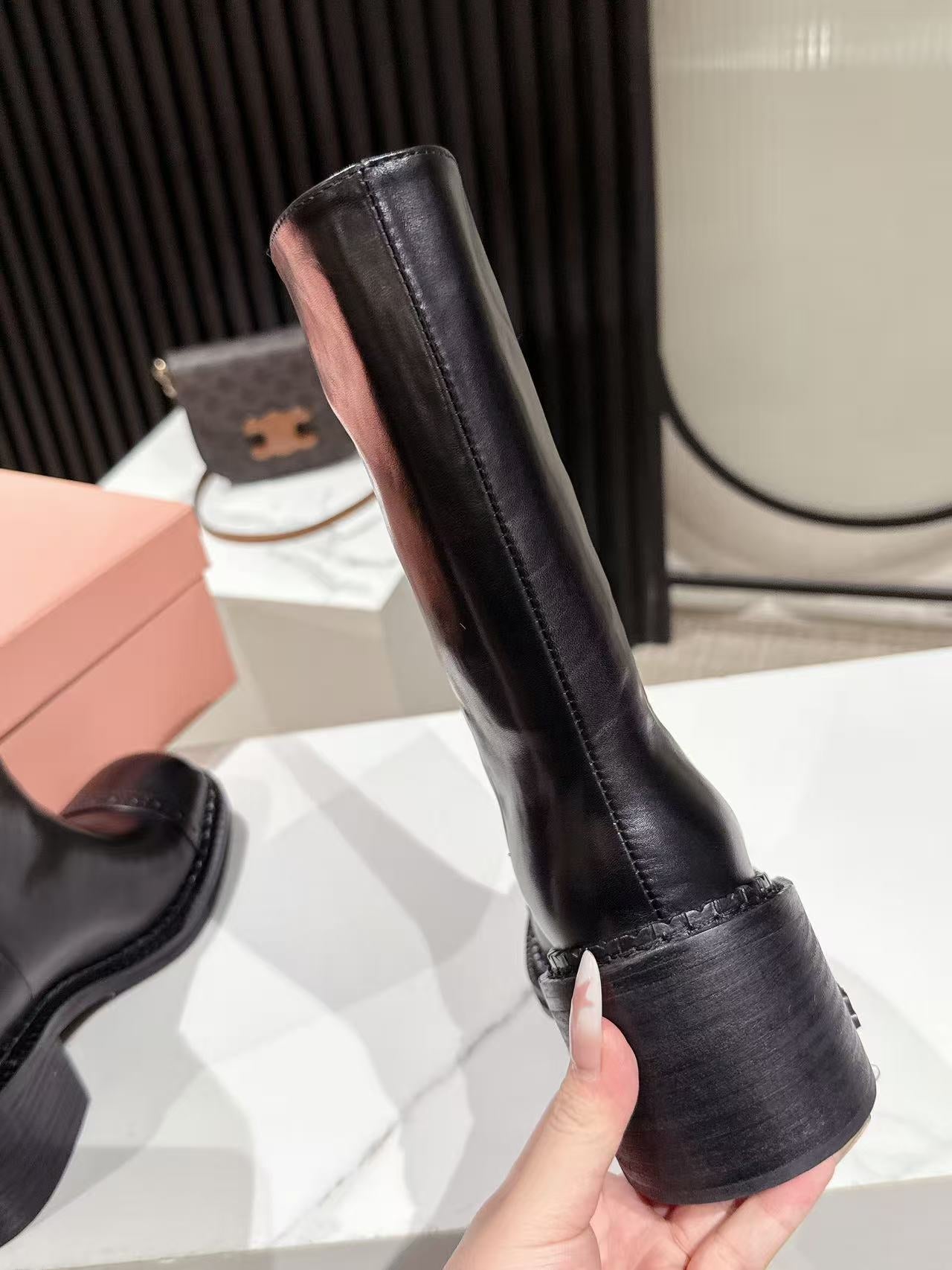 MIUMIU 26S PLATFORM HIGH-HEEL BOOTS 50MM IN BLACK GLOSSY CALFSKIN
