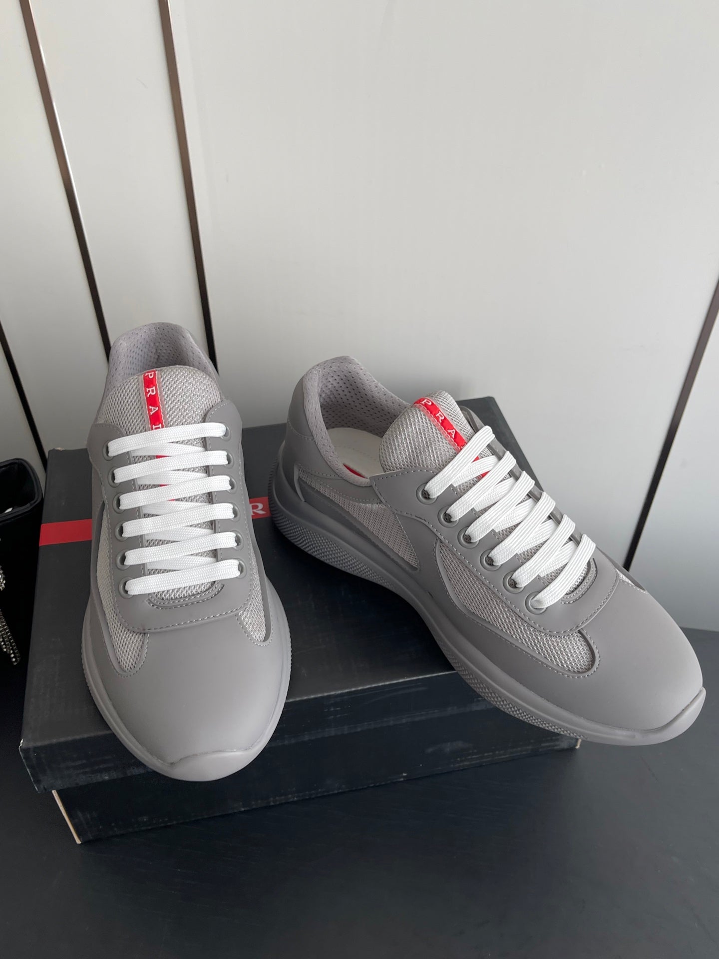 PRADA 26S AMERICA CUP SNEAKERS IN COOL GRAY SOFT RUBBER AND BIKE FABRIC
