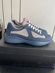 PRADA 26S AMERICA CUP SNEAKERS IN SLATE BLUE SOFT RUBBER AND BIKE FABRIC